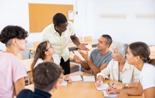 Adult students practicing asking better questions