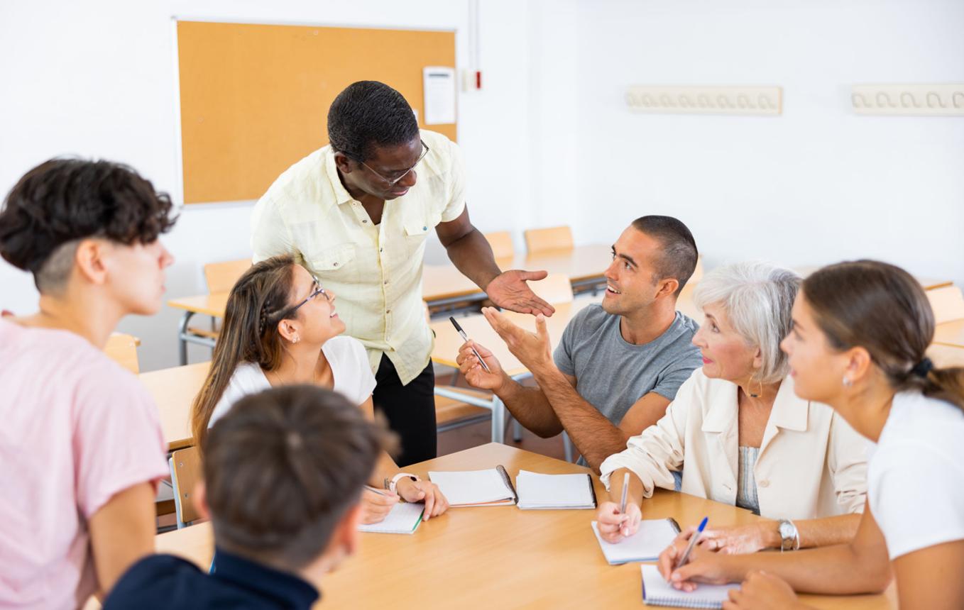 Adult students practicing asking better questions
