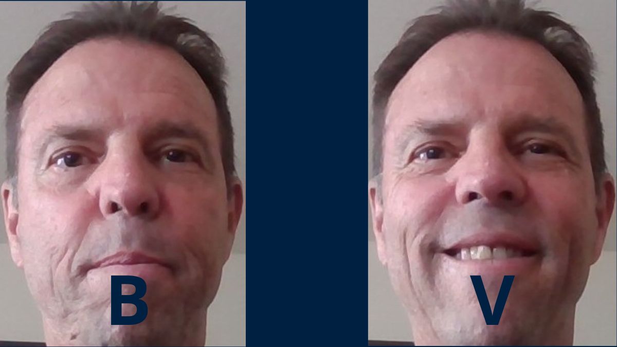 adult ESL teacher demonstrating mouth position for English pronunciation during speaking practice