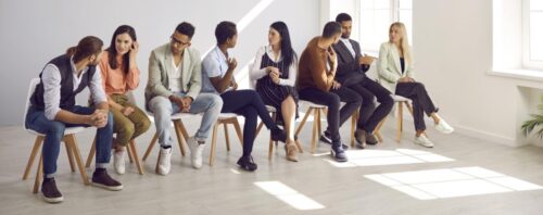Group of adult students communication with each other asking follow up questions